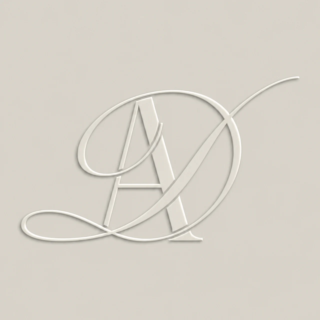 Ivory embossed Doll Aesthetics monogram on a light greige background